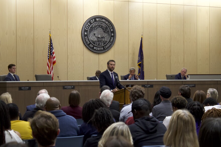 Luke Waddell addressing the public as a councilmember to give his farewell speech