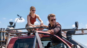 Twisters main characters Kate Cooper, played by Daisy Edgar-Jones, and Tyler Owens, played by Glen Powell.