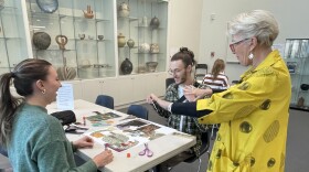 Susie Andruk teaching a free studio art class at the Nora Eccles Harrison Museum of Art.