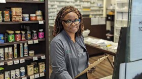 Dr. Anna Peoples owns Peoples Pharmacy in Norfolk and uses her business to help build trust among people who historically mistrust health care providers. (Photo by Nick McNamara)