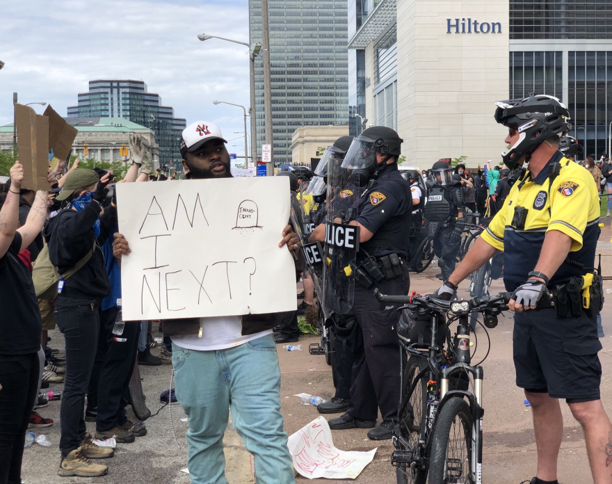 a photo of a protester in Cleveland. 