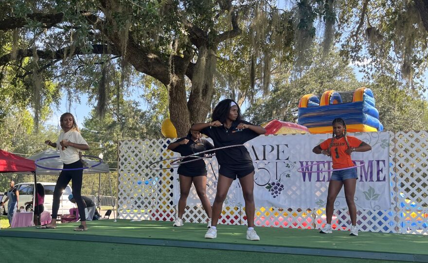 Women compete in the hula hoop competition