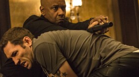 Denzel Washington stars as a retired intelligence officer in <em>The Equalizer</em>.