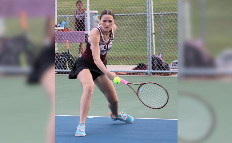Crosby-Ironton senior Tori Oerhlein takes a swing in a 2025 tennis match.