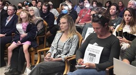 Attendees at the Oct. 23 Asheville City Council meeting where the location of storm debris sites remained a hot topic.