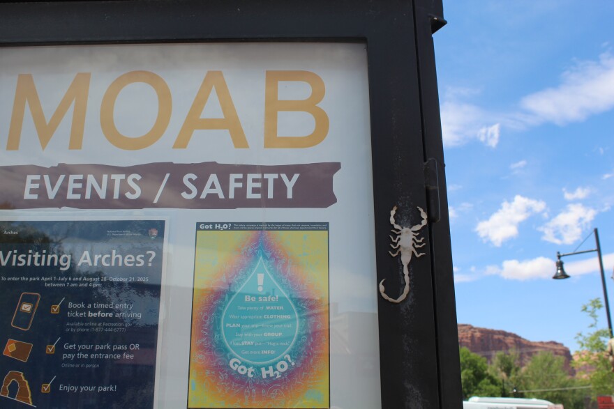 The city of Moab posts informational signs around town, reminding visitors of rules around outdoor recreation on public lands, and reminding them to take precautions against heat.