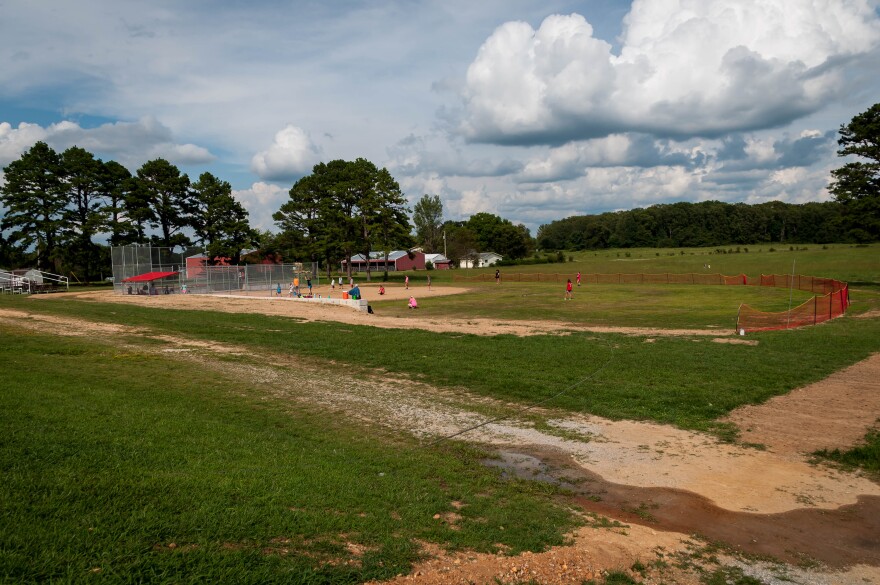 After school softball practice at Glenwood Elementary School in Howell County. The school of 240 kids has no school resource officer, but the superintendent is reconsidering arming teachers or staff.