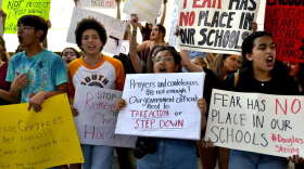 Local high school students wave signs and chant, "You are responsible," "we are not responsible" and "enough is enough" at a rally on Saturday in Fort Lauderdale./Photo: Jessica Bakeman / WLRN