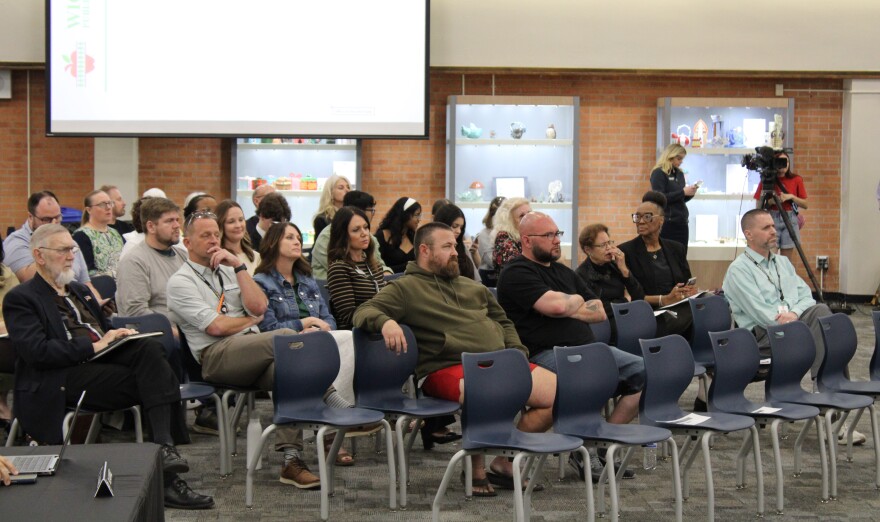 The gallery in the board meeting room on Monday was relatively full, with a number of people showing up to show their support for keeping schools open.