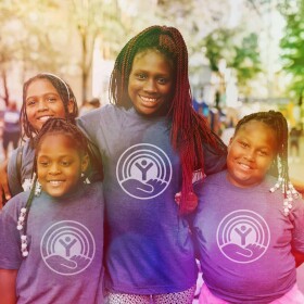 Group of people wearing t-shirts with United Way logo.