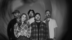 a group of people posing 