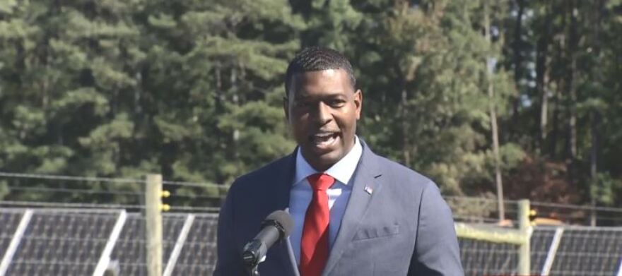 N.C. Environmental Secretary Michael Regan spoke at Monday's signing of a state executive order to fight climate change.