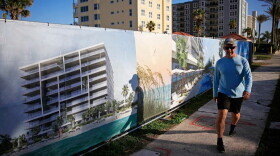 Pete Lafser passes the site of Azure luxury condominiums on Feb, 23 in Jacksonville Beach.