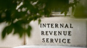 FILE - A sign is displayed outside the Internal Revenue Service building May 4, 2021, in Washington. (AP Photo/Patrick Semansky, File)