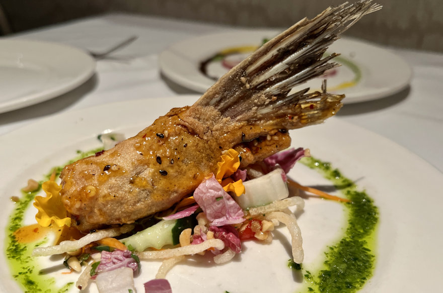 Fins wings are fried fish collars at GW Fins restaurant.