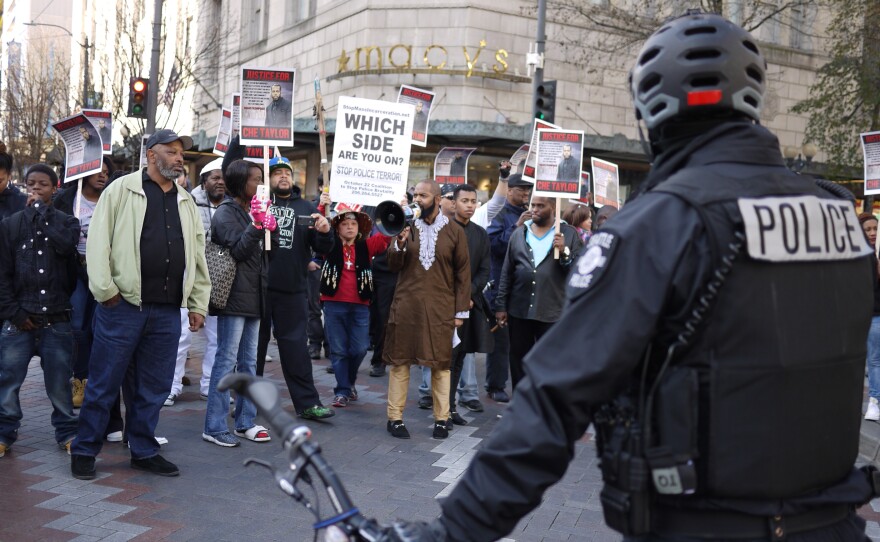 A march protesting the Seattle police shooting of Che Taylor on Feb. 21 moves through downtown Seattle on Feb. 25, 2016.