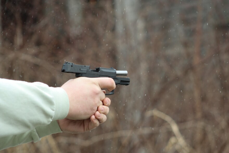 Daniel Lane shoots at a Liberal Gun Club Training in Shelby, Ohio, on Feb. 22, 2026. Lane grew up in a conservative household and has been shooting since he was young, but he wanted to brush up his skills with a cohort of other left-leaning Ohioans.