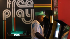 Joshua Ntreh plays PacMan at Free Play Arcade in Richardson. Free Play charges a single price for all-day play.
