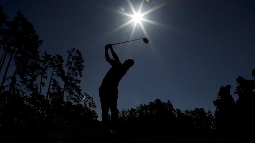 Hideki Matsuyama, of Japan, watches his tee shot on the 14th hole during a practice round for the Masters golf tournament Tuesday in Augusta, Ga.