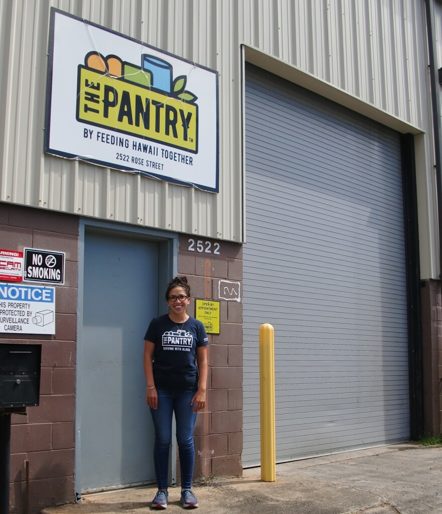 Executive Director Jennine Sullivan in front of The Pantry on Rose Street in Kalihi.