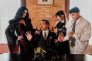 Morticia, Gomez, Wednesday, and the young man Wednesday has taken a shine to.