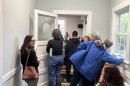 People spilled out of a select board public comment session on a potential data center in Bow, New Hampshire.