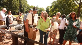 Sherman White and City of FredericksburgÕs M.C. Morris take pictures of panels commemorate pioneering Black students at the University of Mary Washington on Tuesday July 16, 2024 in Fredericksburg.