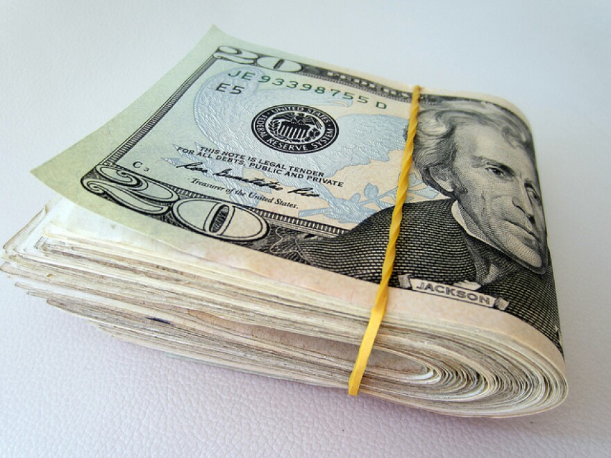 A picture of a folded wad of cash.