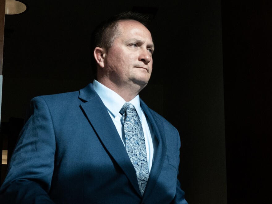 Paramedic Jeremy Cooper leaves court in the Adams County Justice Center on Friday, Dec. 1, 2023.