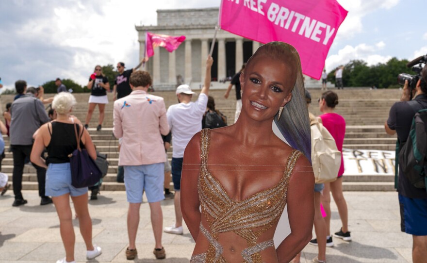 Fans and supporters of pop star Britney Spears protest at the Lincoln Memorial, during the "Free Britney" rally, Wednesday, July 14, 2021, in Washington. Rallies have been taking place across the country since the pop star spoke out against her conservatorship in court last month. (AP Photo/Jose Luis Magana)