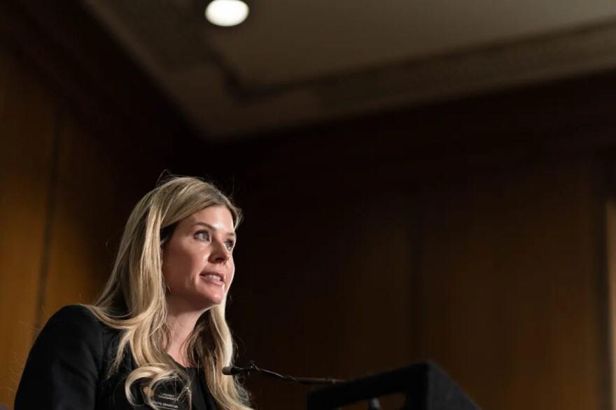 State Sen. Lindsey Daugherty, D-Arvada, speaks to reporters before Gov. Jared Polis signs a bill in the governor’s office at the Colorado Capitol in Denver on April 24, 2025.