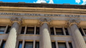 U.S. District Court Judge Sarah Evans Barker halted a new process for teachers to get union dues automatically deducted from their paychecks.