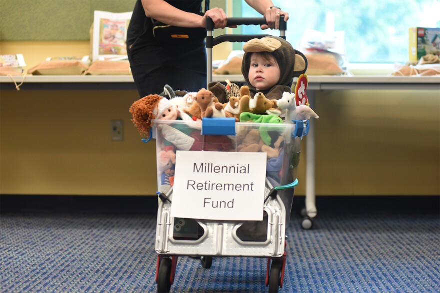 Tess Tuschhoff wheels Timber Tuschhoff, 2, in front of the judges during the 10th Annual Cosplay Con on Monday, July 28, 2025, at Daniel Boone Regional Library in Columbia. Timber won first in the 0 to 2 age division dressed as a “Beanie Baby.”