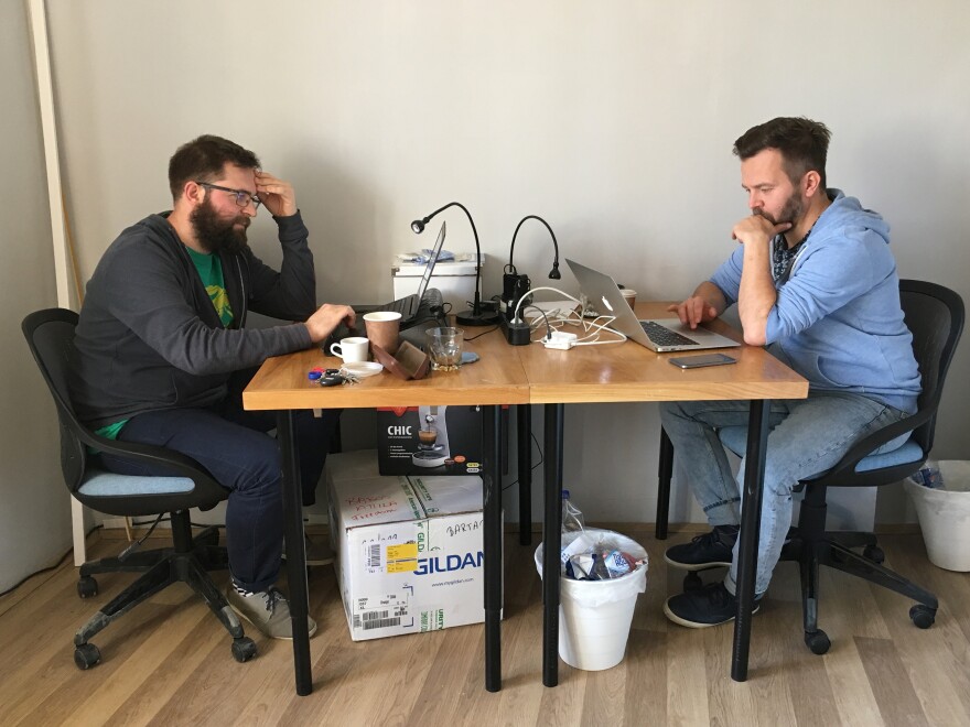 Journalists Ervin Guth (left) and Ferenc Nimmerfroh work out of a small office in downtown Pecs, a city in southern Hungary. They and colleague Attila Babos started the independent news site Szabad Pecs (Free Pecs) after the local newspaper where they worked was purchased by a pro-government media company.