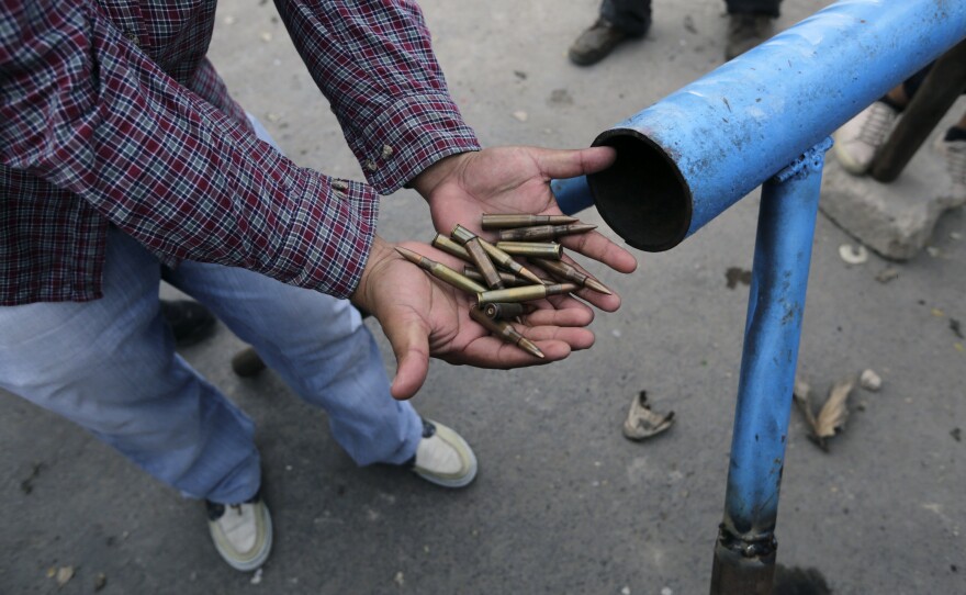 An anti-government demonstrator shows ammunition taken from the police during clashes in the Nicaraguan town of Las Maderas, near the capital city of Managua, on June 6, 2018.