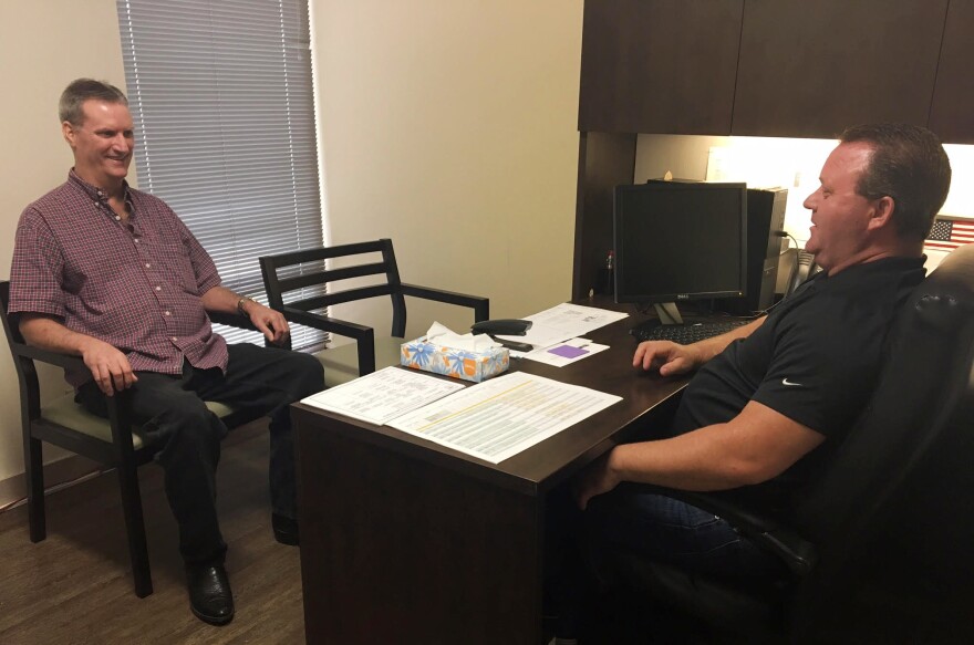 David Woodside visits David Yarborough's office several times a week to get helpful coaching on how to manage the symptoms of his bipolar and schizoaffective disorder. "Dave's been through a lot of the things I've been through — and vice versa," Woodside says.