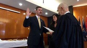 District Attorney Steve Kunzweiler takes the oath of office.