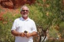 Washington County Water Conservancy District Conservation Manager Doug Bennett stands beside some shade-giving trees at the Red Hills Desert Garden in St. George, Aug. 20, 2026.