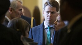 Miles Taylor speaks with Ohio Senator Rob Portman and former Homeland Security Secretary Kirstjen Nielsen after the Republican Caucus luncheon on Capitol Hill in Washington on March 5, 2019.