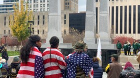 The Grider family attends a Veterans Day memorial service in downtown Peoria on Nov. 11, 2021.