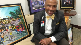 Dr. Henri Ford is the new dean at the University of Miami Miller School of Medicine. His diplomas and art were waiting to be hung in his new office.