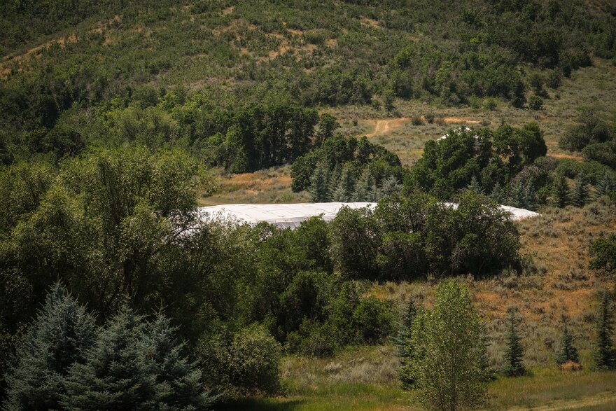 An artificial “glacier” of last season’s snow as seen from the base of Soldier Hollow Nordic Center on July 30, 2026.
