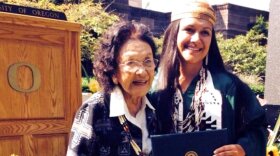 In this 2014 photo, Emilee Risling (right) poses at her University of Oregon graduation ceremony with her great-aunt and adoptive grandmother, Viola Risling-Ryerson (center.) 