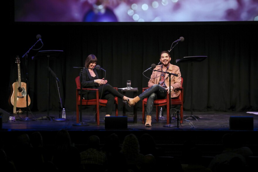 Host Ophira Eisenberg talks to Adam Lambert on Ask Me Another at the Balboa Theatre in San Diego, California.