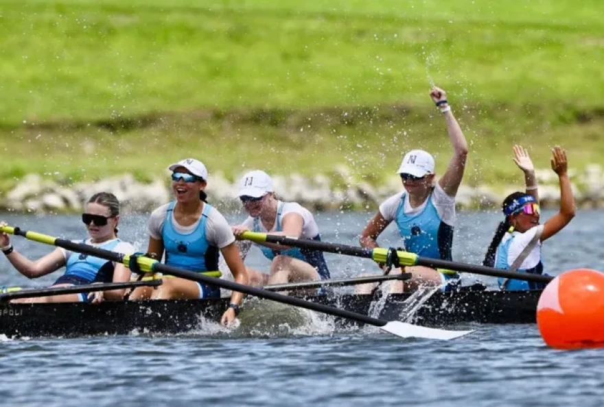 Narragansett Boat Club's U 17 Coxed Four exults after crossing the finish line first at the USRowing National Youth Championships.