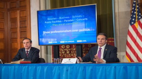 Governor Andrew Cuomo, right, speaks at the daily COVID-19 briefing on Monday. Health Commissioner Dr. Howard Zucker is at left.