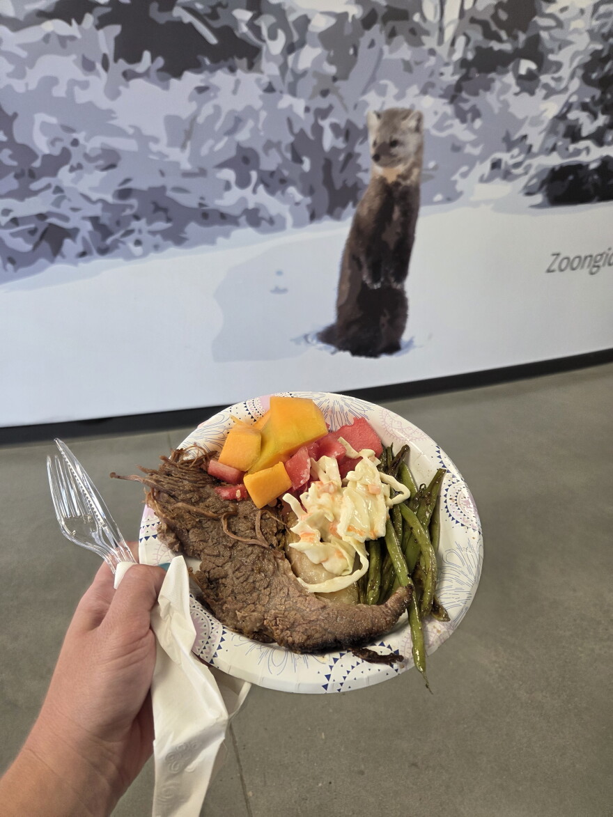 Attendees of Endazhi-Nitaawiging's ribbon-cutting on Aug. 25, 2026, were treated to Red Lake-raised foods: roasted bison, grilled green beans, coleslaw, cantaloupe and watermelon.