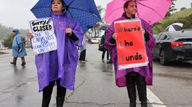 Los Angeles Unified School District (LAUSD) workers and supporters rally outside a LAUSD district office. (Mario Tama/Getty Images)