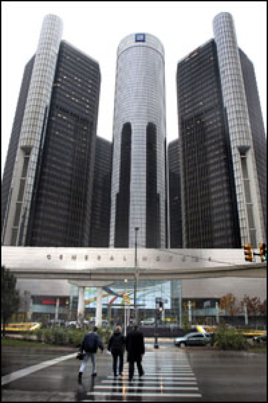 The General Motors world headquarters in Detroit. The Big Three automakers are petitioning Congress for $25 billion in aid.