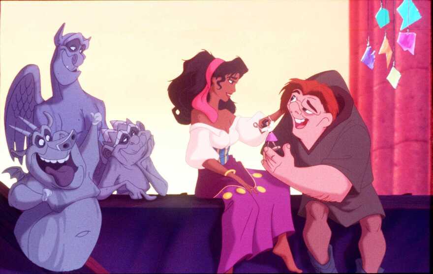 Esmerelda, Quasimodo and the gargoyles in <em>The Hunchback of Notre Dame,</em> 1996